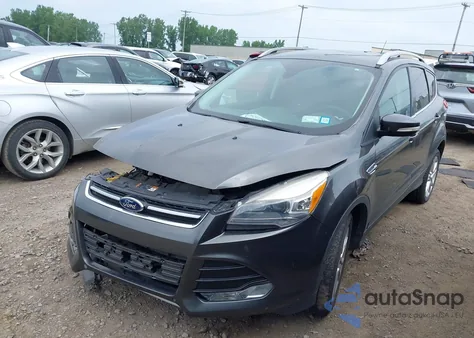 2016 Ford Escape Titanium z USA, uszkodzony, nr VIN 1FMCU9J93GUA62977